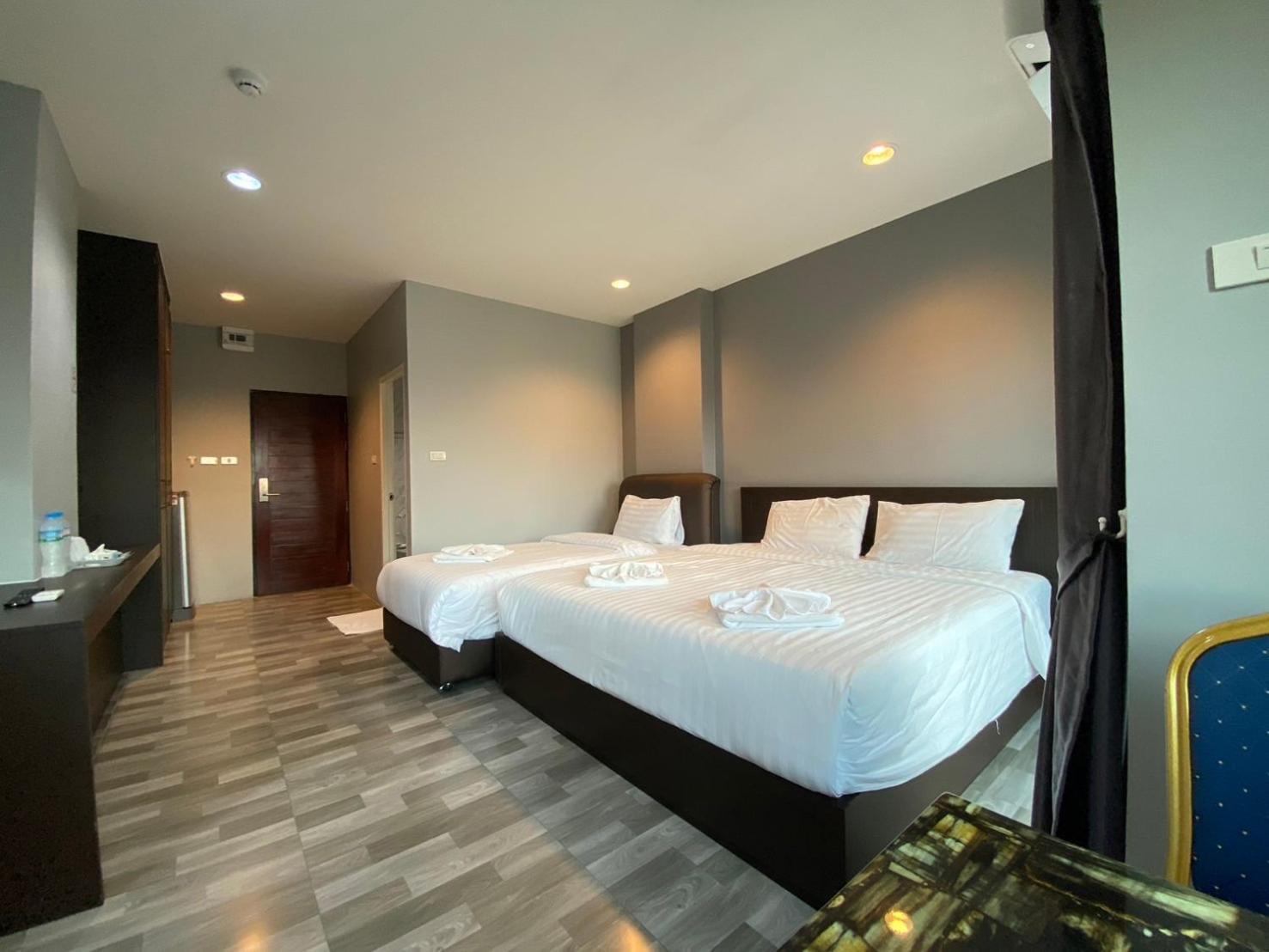 Grand Inter Hotel Samut Sakhon Стая снимка